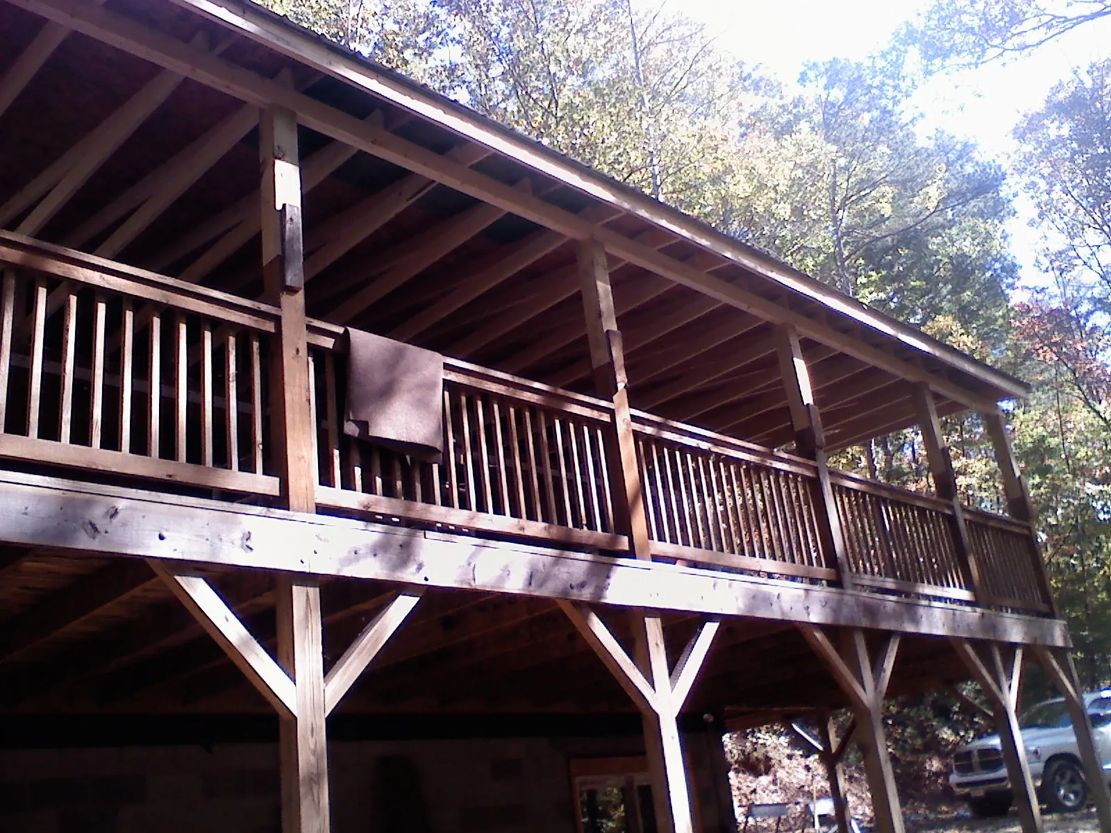 Timber framing under a new elevated porch and deck — Roof Leak Repair in Balsam Grove by Roofing Brothers